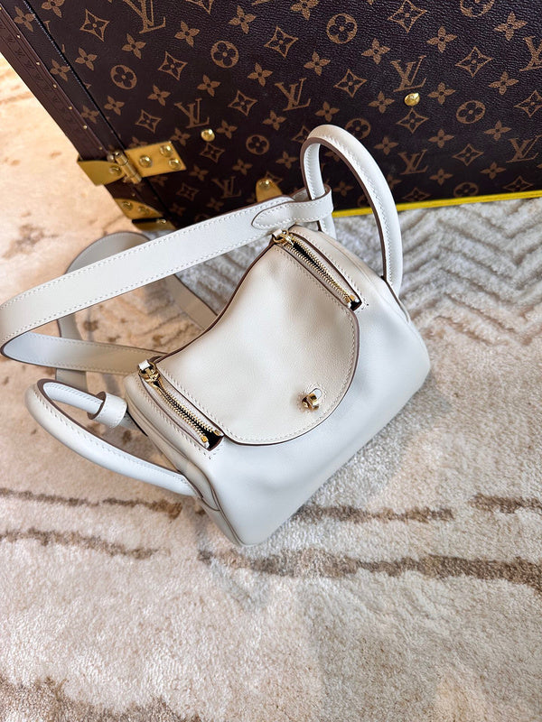 Side view of sleek structured handbag