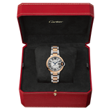 Close-up detail view of Cartier unisex rose gold watch