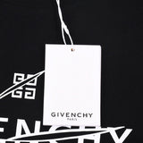 Flat lay presentation of Givenchy luxury clothing with monogram-inspired silhouette