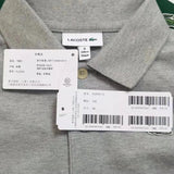 Close-up detail shot of Lacoste luxury clothing with signature branding