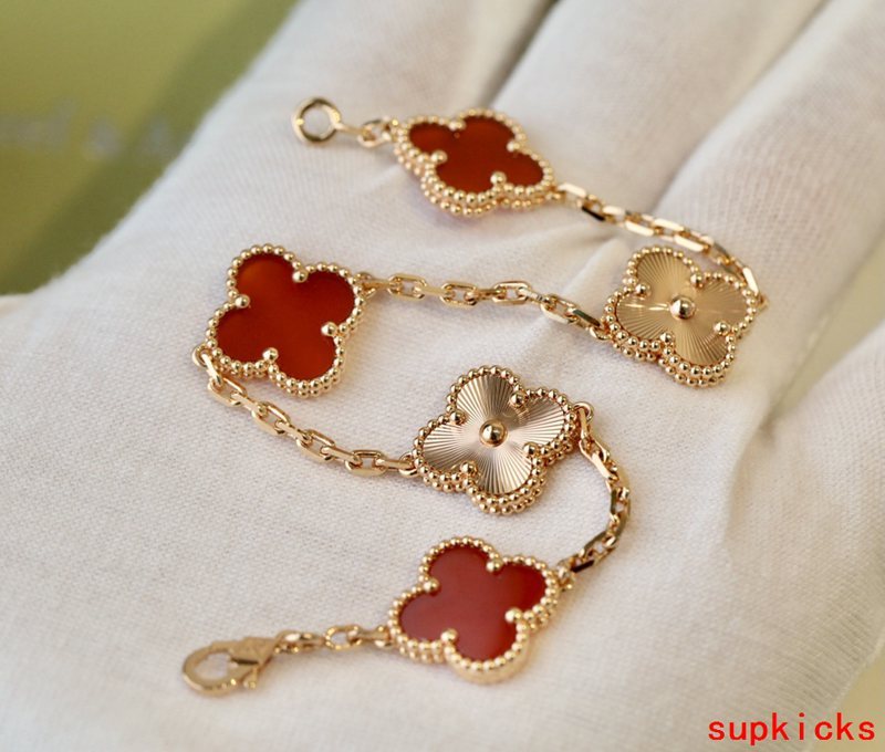 Lifestyle view of Van Cleef & Arpels unisex jewelry piece