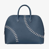Side view of versatile structured handbag