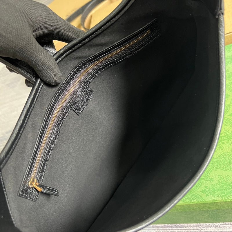 Side view of clean-lined structured handbag