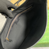 Side view of clean-lined structured handbag