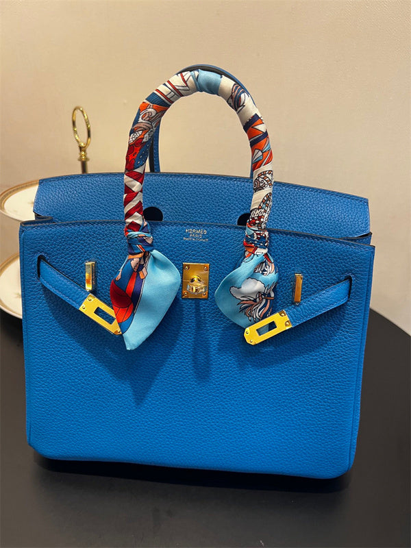 Side view of modernist structured handbag