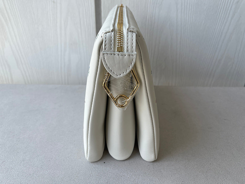 Front view of structured premium women's handbag – women's designer-style accessory
