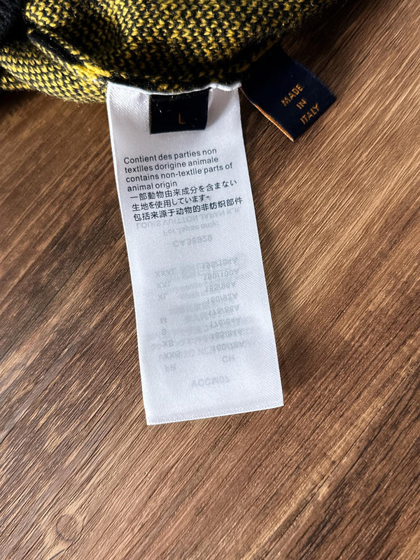 Front view of Louis Vuitton luxury clothing with logo-detail design