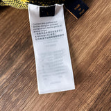 Front view of Louis Vuitton luxury clothing with logo-detail design