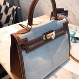 Side view of minimalist structured handbag