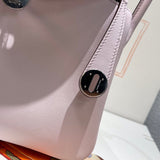 Side view of classic structured handbag