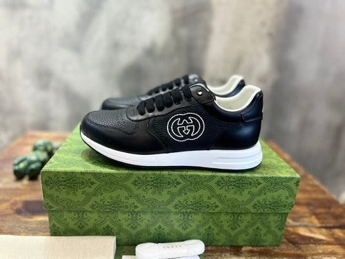 Gucci tonal black luxury sneakers view 11 bold athletic profile