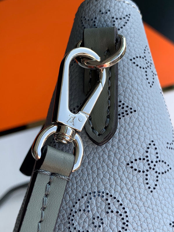 Side profile of statement elevated women's handbag – women's designer-style accessory