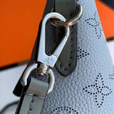 Side profile of statement elevated women's handbag – women's designer-style accessory