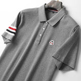 Flat lay presentation of Moncler luxury clothing with contemporary cut