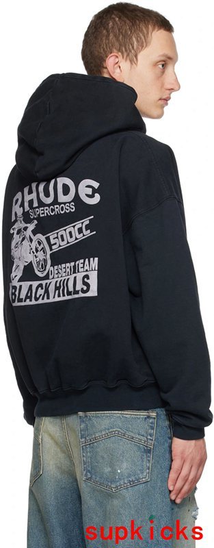 Side profile of Rhude luxury clothing with signature branding