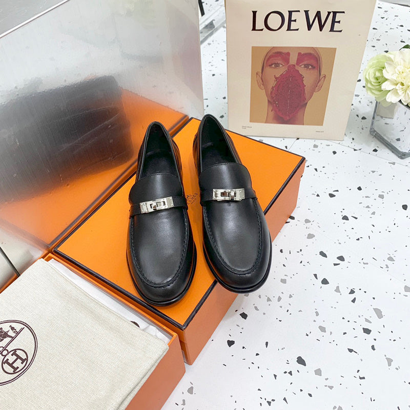 Hermes sandals Style 156 - close-up of classic monogram styling