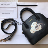 Sophisticated Faux Leather Handbag - Premium Craftsmanship Detailing | Women's Fashion Handbag #879 - side angle view (image 2) of designer-inspired handbag