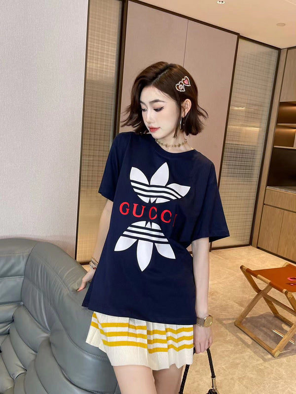 Front view of Gucci luxury clothing with signature branding