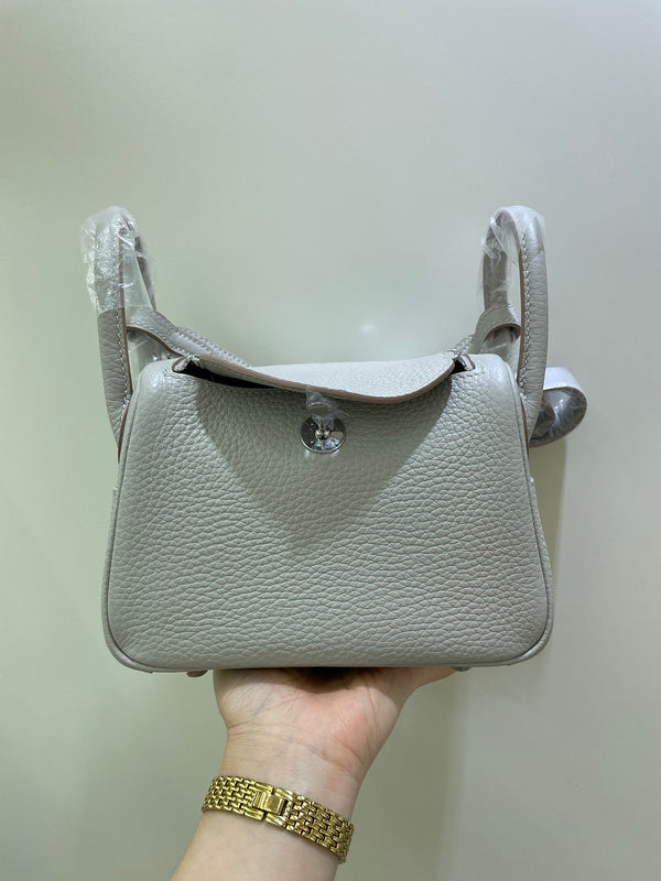 Side view of tailored structured handbag