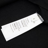 Close-up detail shot of Polo cotton polo shirt with logo-detail design