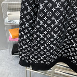 Flat lay presentation of Louis Vuitton luxury clothing with monogram-inspired silhouette