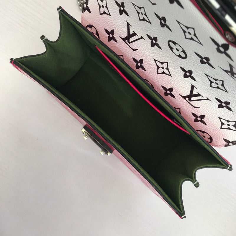 Front view of structured modern women's handbag – women's statement bag