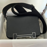 Side view of sophisticated structured handbag