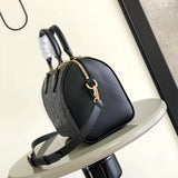  Modern structured bag carried on shoulder