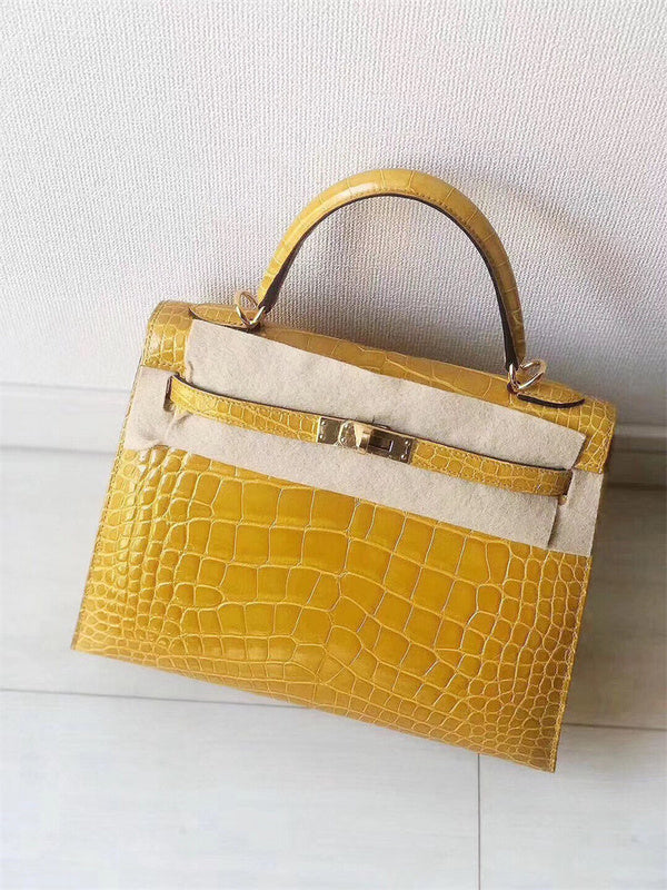 Side view of streamlined structured handbag