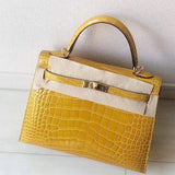 Side view of streamlined structured handbag