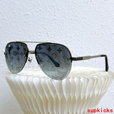 Close-up detail view of Louis Vuitton unisex sunglasses