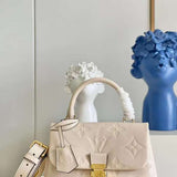 Front view of everyday-luxe sleek women's handbag – women's luxury handbag