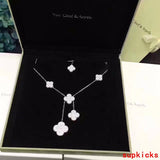 Lifestyle view of Van Cleef & Arpels unisex jewelry piece