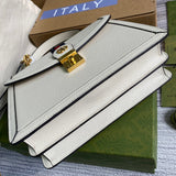 Handle and strap detail of classic everyday-luxe women's handbag – women's statement bag
