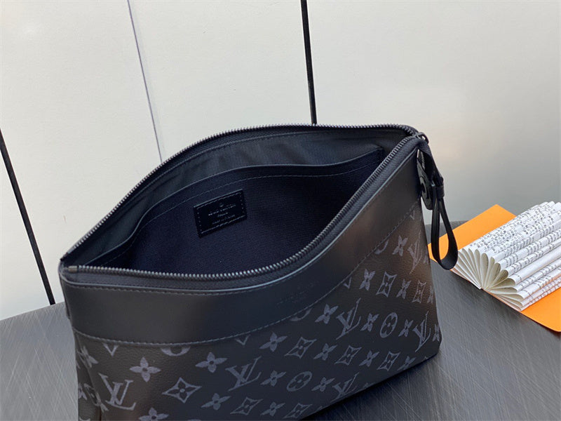  Signature crossbody bag carried on shoulder