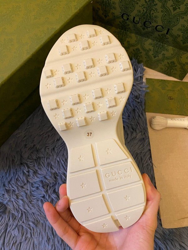 Side profile of Gucci classic monochrome sneakers cushioned comfort fit