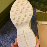 Side profile of Gucci classic monochrome sneakers cushioned comfort fit