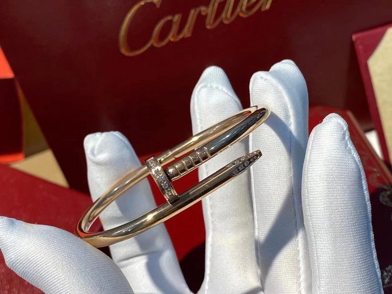 Side view of Cartier unisex jewelry piece