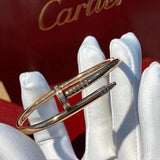Side view of Cartier unisex jewelry piece