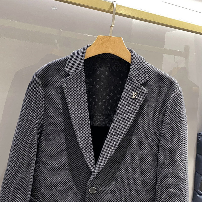 Close-up detail shot of Louis Vuitton luxury clothing with relaxed-fit cut