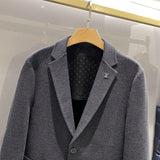 Close-up detail shot of Louis Vuitton luxury clothing with relaxed-fit cut