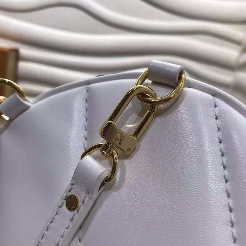 Handle and strap detail of elevated everyday-luxe women's handbag – women's designer-style accessory