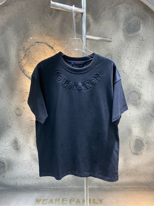 Close-up detail shot of Louis Vuitton cotton t-shirt with runway-inspired design