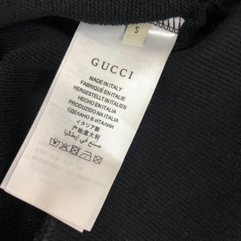 Side profile of Gucci luxury clothing with relaxed-fit cut