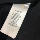 Side profile of Gucci luxury clothing with relaxed-fit cut