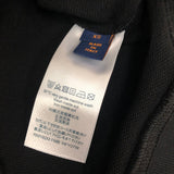 Side profile of Louis Vuitton luxury clothing with tailored silhouette