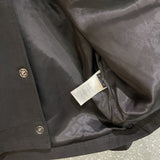 Close-up detail shot of Louis Vuitton luxury clothing with runway-inspired design