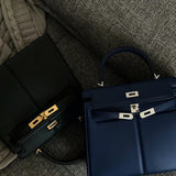 Side view of polished structured handbag
