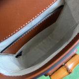 Close-up detail of polished structured women's handbag – women's premium purse