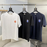 Flat lay presentation of Moncler luxury clothing with relaxed-fit cut